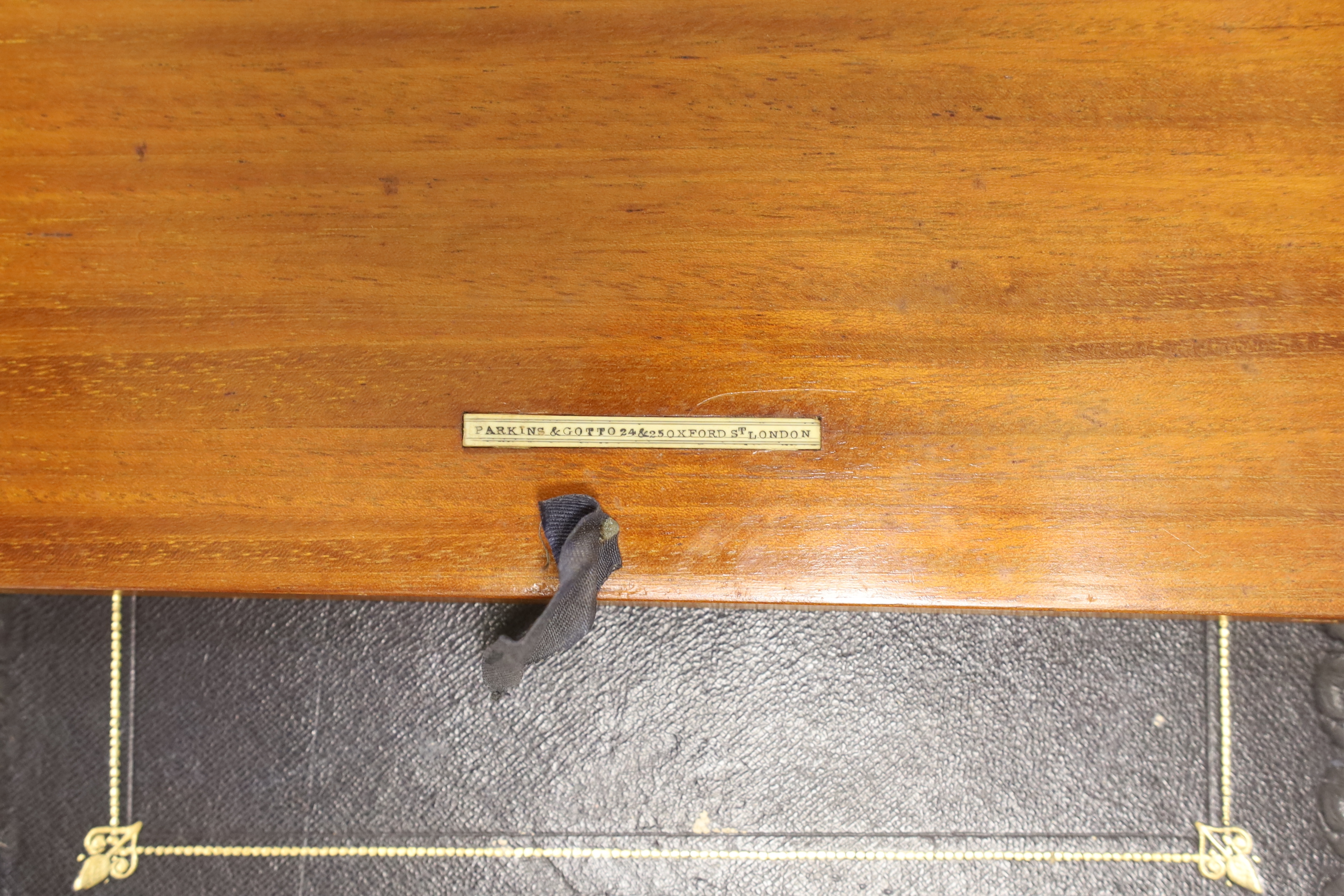 A Victorian burr walnut writing box with tooled leather slope and brass mounts, 30cm wide